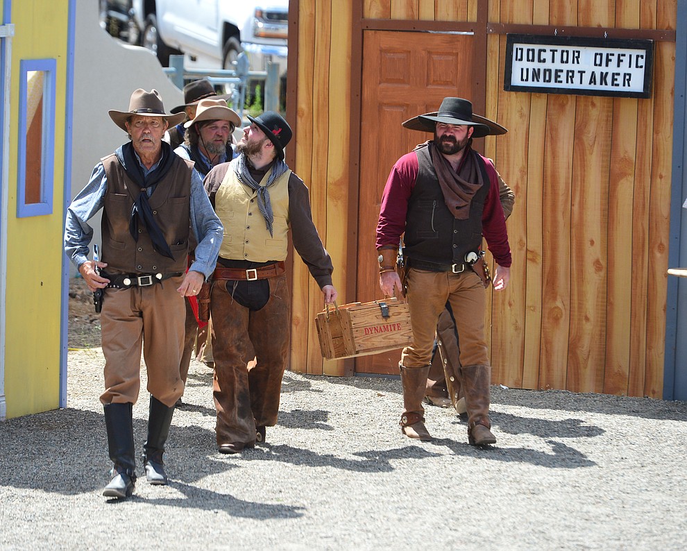 The Superstition Mountain Regulators perform a skit the Whiskey Row Shootout in downtown Prescott Saturday July 27, 2019. (Les Stukenberg/Courier)