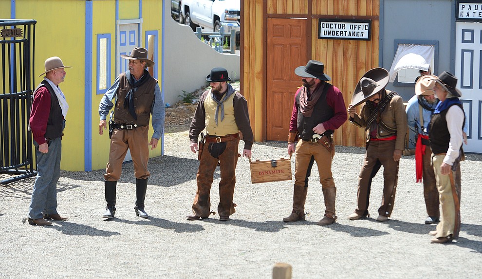 The Superstition Mountain Regulators perform a skit the Whiskey Row Shootout in downtown Prescott Saturday July 27, 2019. (Les Stukenberg/Courier)