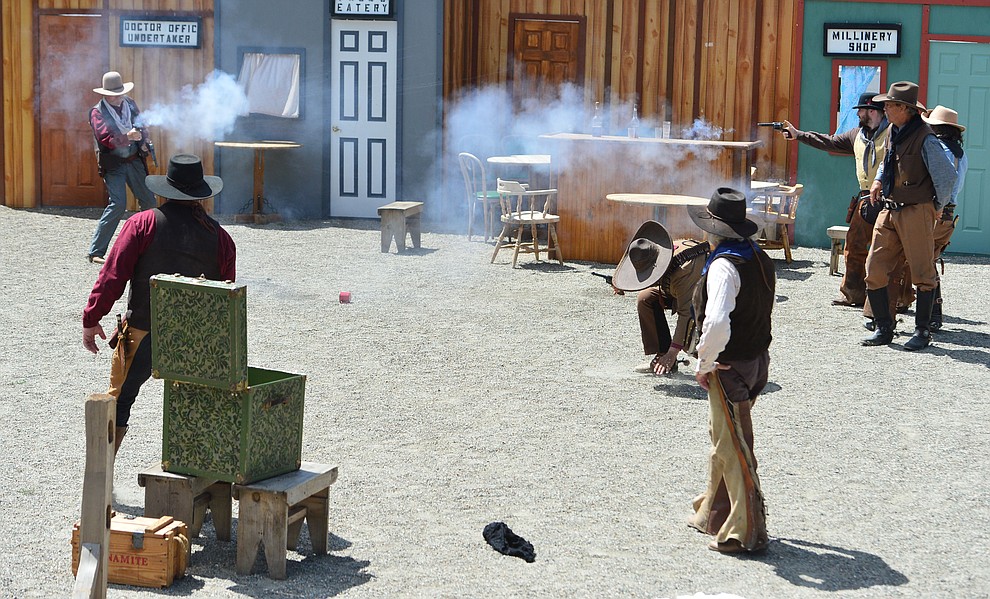 The Superstition Mountain Regulators perform a skit the Whiskey Row Shootout in downtown Prescott Saturday July 27, 2019. (Les Stukenberg/Courier)