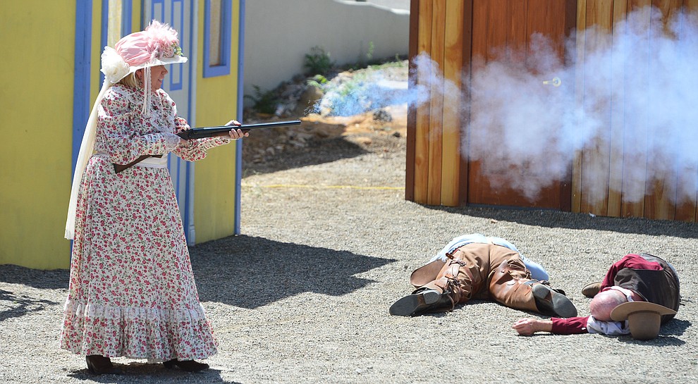 The Superstition Mountain Regulators perform a skit the Whiskey Row Shootout in downtown Prescott Saturday July 27, 2019. (Les Stukenberg/Courier)