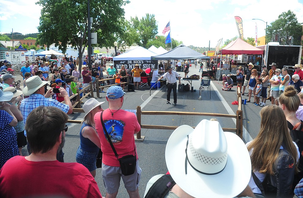 Johnny Hotshot performs rope tricks at the Whiskey Row Shootout in downtown Prescott Saturday July 27, 2019. (Les Stukenberg/Courier)