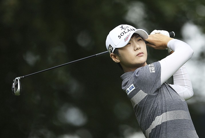 South Korea’s Park Sung-hyun plays off the 12th tee on day one of the AIG Women’s British Open at Woburn Golf Club, Little Brickhill, England, Thursday Aug. 1, 2019. (Steven Paston/PA via AP)