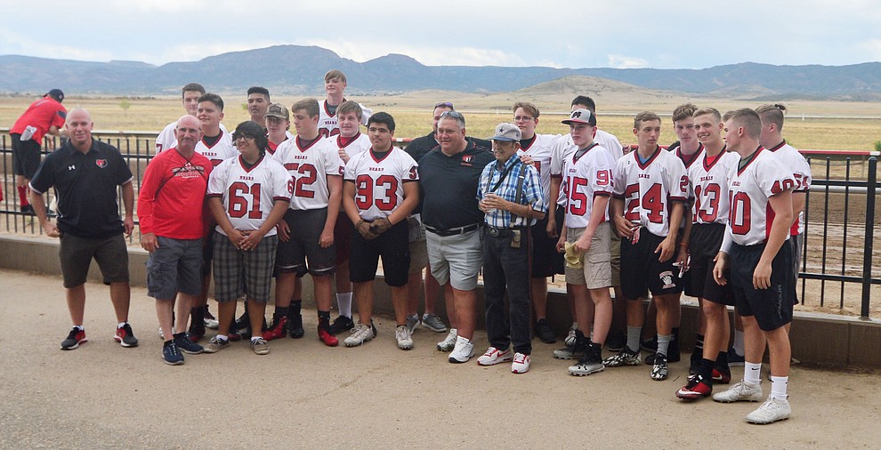 Bradshaw Mountain High School football players gather before taking on the jockeys from Arizona Downs in a tug-a-war Saturday, August 3, 2019, in on the racetrack in Prescott Valley. (Les Stukenberg/Courier)