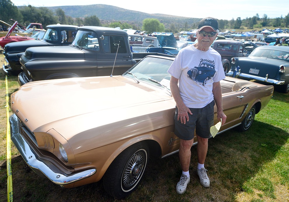 Prescott resident Ron Meadows and his 1965 Mustang that he bought new for $3000 at the 45th Annual Prescott Antique Auto Club Watson Lake Car Show Saturday, August 3, 2019, in Prescott. The show continues Sunday from 8 a.m. to 3 p.m. (Les Stukenberg/Courier)