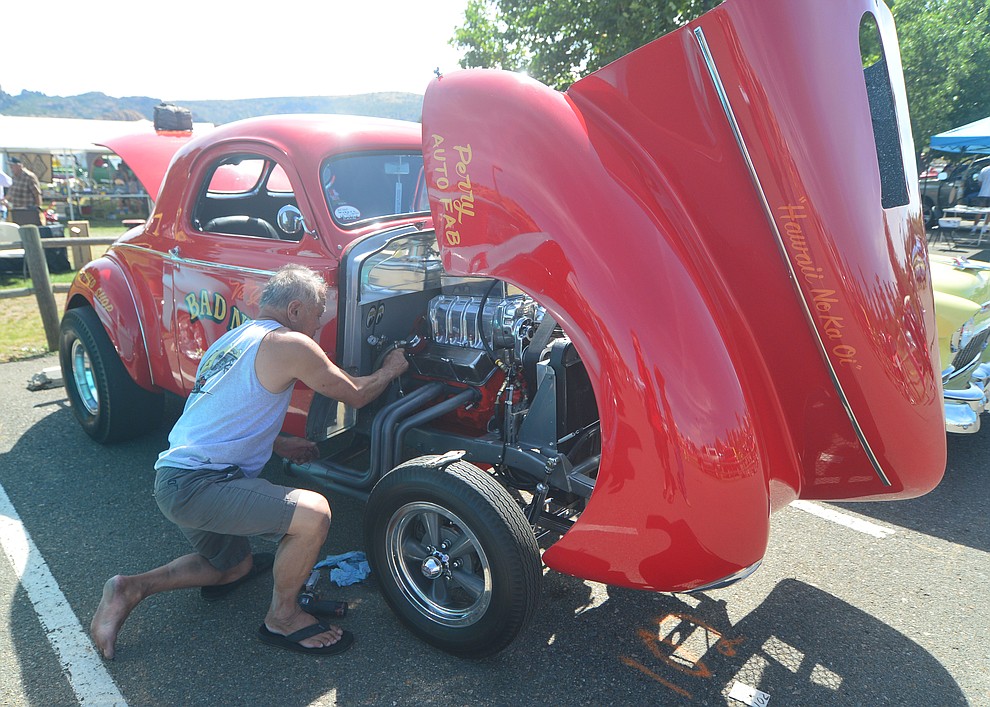 Some work being done on site at the 45th Annual Prescott Antique Auto Club Watson Lake Car Show Saturday, August 3, 2019, in Prescott. The show continues Sunday from 8 a.m. to 3 p.m. (Les Stukenberg/Courier)