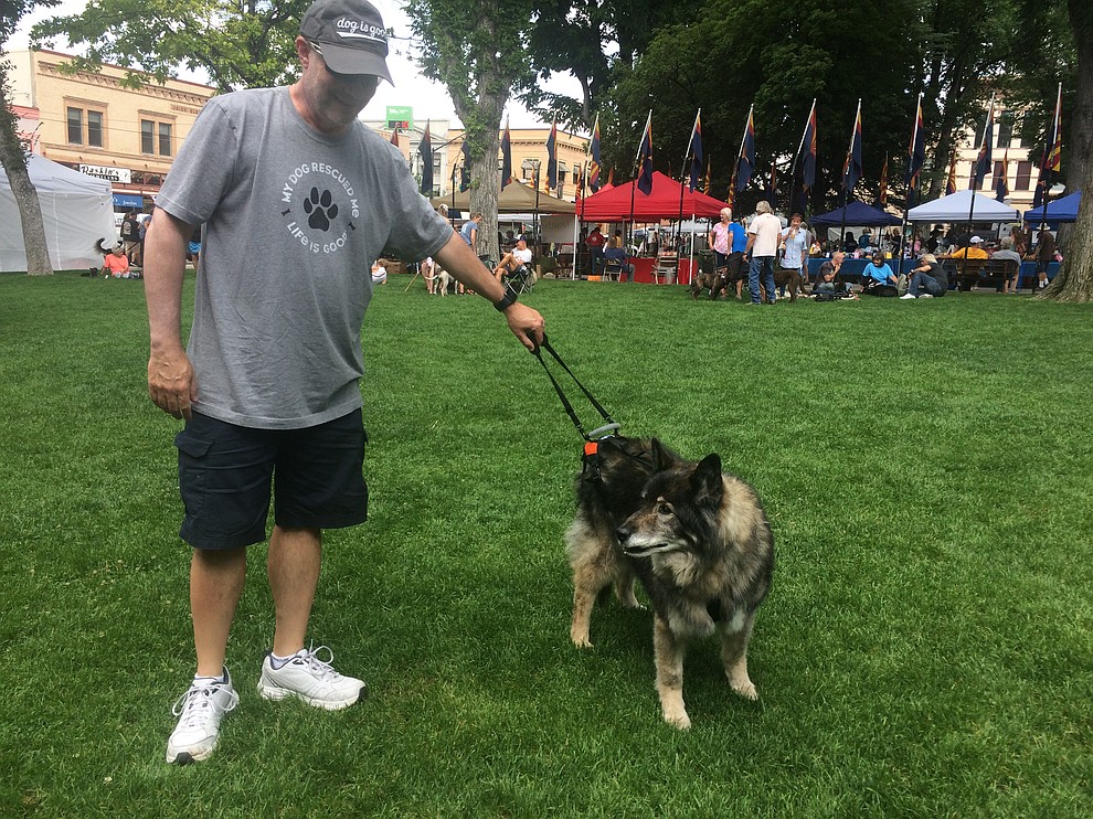 Trooper, who won 'Most Beautiful Senior' and Robin Green at the Woof Down Lunch at courthouse plaza Saturday, Aug. 3. (Jason Wheeler/Courier)
