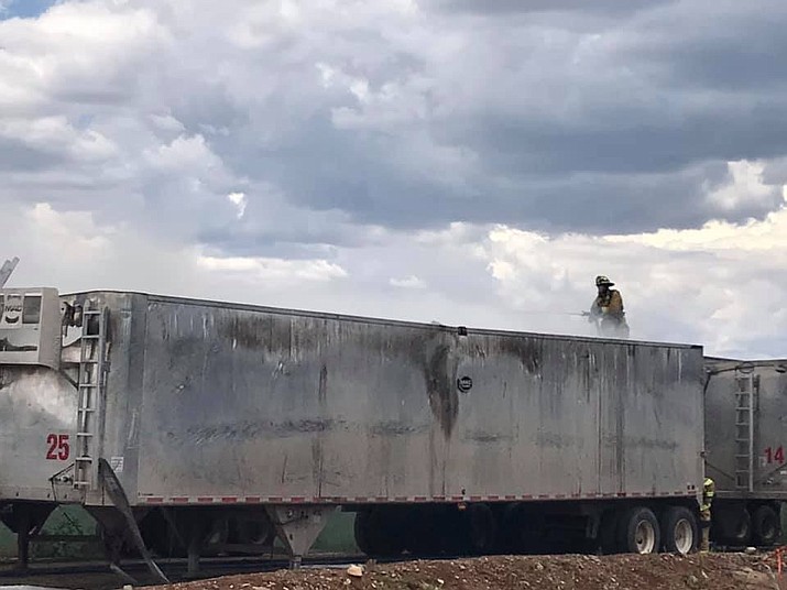 Firefighters work to put out a fire in a 48-foot-long trailer at Patriot Disposal in Prescott Valley Sunday afternoon, Aug. 4. (CAFMA/Courtesy)