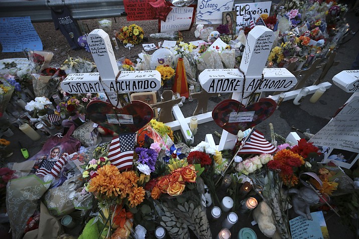 Crosses bear the names of the people killed at a Walmart Saturday during a memorial Monday, Aug. 5, 2019, in El Paso, Texas. (Mark Lambie/The El Paso Times via AP)