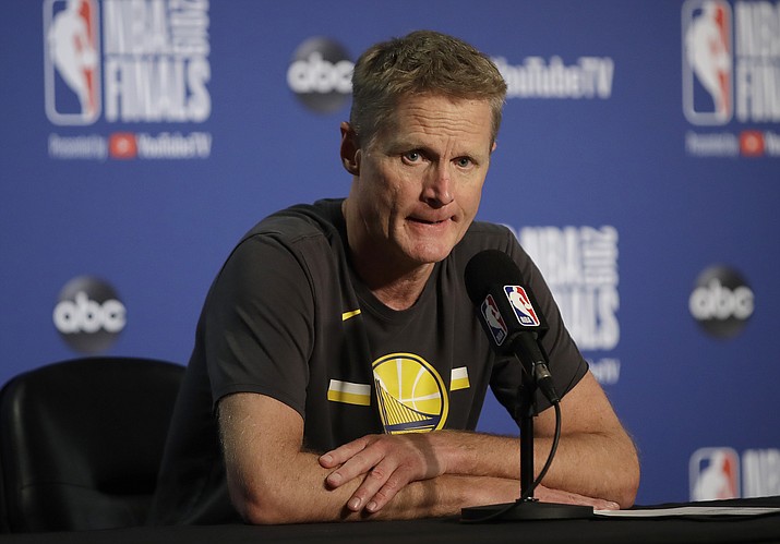 In this June 5, 2019, photo, Golden State Warriors head coach Steve Kerr speaks at a news conference after Game 3 of the NBA Finals against the Toronto Raptors in Oakland, Calif. Kerr said he knows that a new era of Warriors basketball is about to begin. (Ben Margot/AP, File)