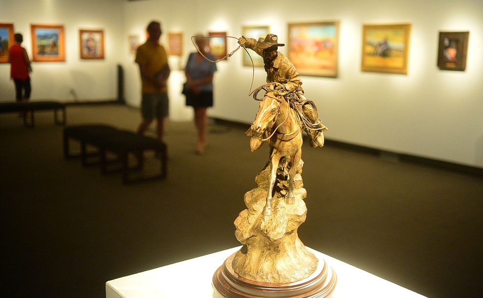 Artists Joe Netherwood, Bill Nebeker, Steve Atkinson, Shawn Cameron and Marless Fellows have artwork on display in the Yavapai College Gallery at the 32nd Annual Arizona Cowboy Poets Gathering Friday, August 9, 2019, being held at the Prescott campus of Yavapai College. The event continues Saturday with workshops from 9 a.m. to 5 p.m. and a show, tickets required, at the Performance Hall at 7 p.m. featuring Mark Munzert, Gail Steiger, Jay Snider and The Cowboy Way Trio. (Les Stukenberg/Courier)