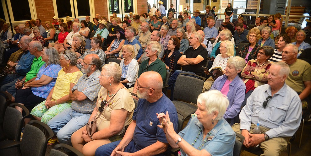 A large crowd watches the Rusty Pistols Reloaded perform in the first breakout session at the 32nd Annual Arizona Cowboy Poets Gathering Friday, August 9, 2019, being held at the Prescott campus of Yavapai College. The event continues Saturday with workshops from 9 a.m. to 5 p.m. and a show, tickets required, at the Performance Hall at 7 p.m. featuring Mark Munzert, Gail Steiger, Jay Snider and The Cowboy Way Trio. (Les Stukenberg/Courier)