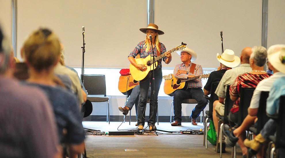 Trinity Seeley performs in the first breakout session at the 32nd Annual Arizona Cowboy Poets Gathering Friday, August 9, 2019, being held at the Prescott campus of Yavapai College. The event continues Saturday with workshops from 9 a.m. to 5 p.m. and a show, tickets required, at the Performance Hall at 7 p.m. featuring Mark Munzert, Gail Steiger, Jay Snider and The Cowboy Way Trio. (Les Stukenberg/Courier)