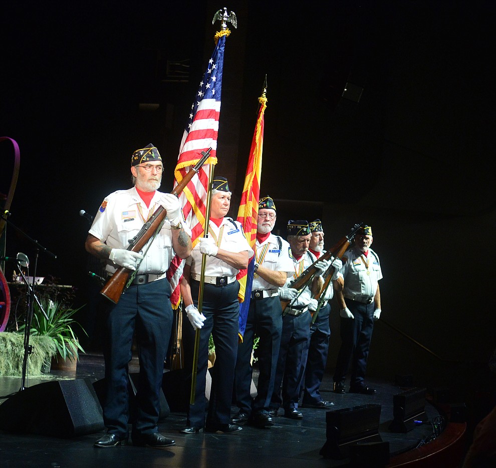 American Legion Post 6 Color Guard posts the colors at the 32nd Annual Arizona Cowboy Poets Gathering Friday, August 9, 2019, being held at the Prescott campus of Yavapai College. The event continues Saturday with workshops from 9 a.m. to 5 p.m. and a show, tickets required, at the Performance Hall at 7 p.m. featuring Mark Munzert, Gail Steiger, Jay Snider and The Cowboy Way Trio. (Les Stukenberg/Courier)