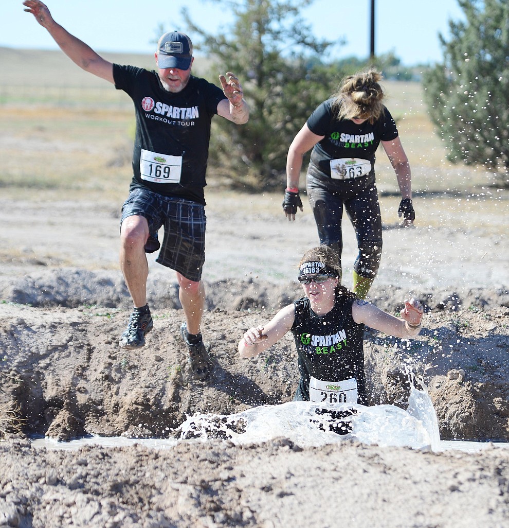 Over 300 people competed in the fourth annual Chino Valley Mud Run at Old Home Manor in Chino Valley Saturday, August 17, 2019. The 5 kilometer race had 22 obstacles that tested each racers endurance and fitness. (Les Stukenberg/Courier)