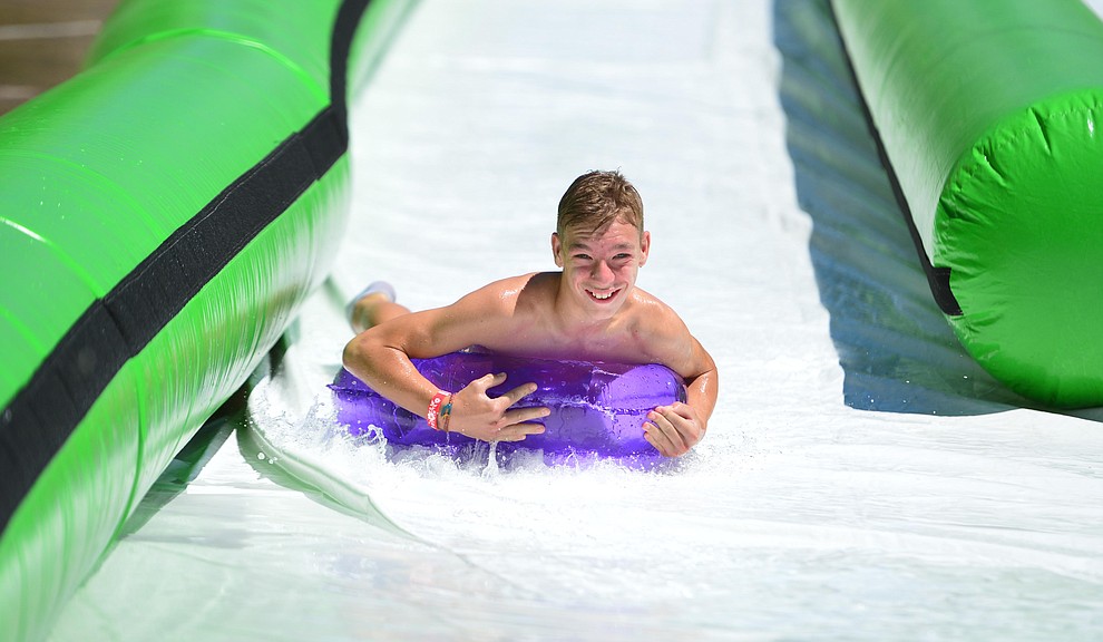 The annual Monsoon Festival with the water slide that stetches most of the length of Union Street Saturday, August 17, 2019, in downtown Prescott. (Les Stukenberg/Courier)