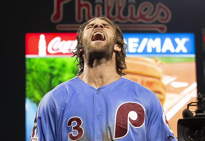 Philadelphia Phillies’ Bryce Harper celebrates the team’s win over the Chicago Cubs in a game Thursday, Aug. 15, 2019, in Philadelphia. The Phillies won 7-5 on a grand slam by Harper in the ninth. (Chris Szagola/AP)