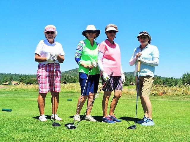 From left: Luanne Lea, Janet Cothran, Sharon Gibson and Suzie Hite dream of birdies at the Friends of the Aquatic Center golf tournament Aug. 17 at Elephant Rocks Golf Course. (B. Garibay/WGCN)