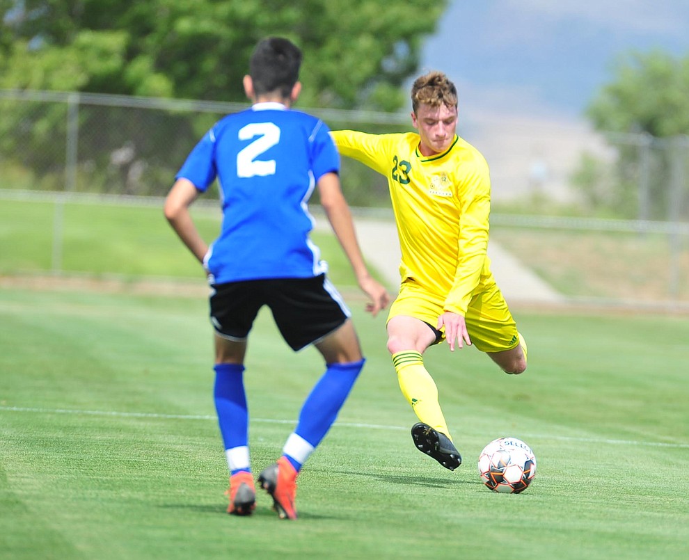 Yavapai's Loic Baures makes a long pass as the Roughriders host South Mountain Community College Thursday, August 22, 2019, in Prescott Valley. (Les Stukenberg/Courier)