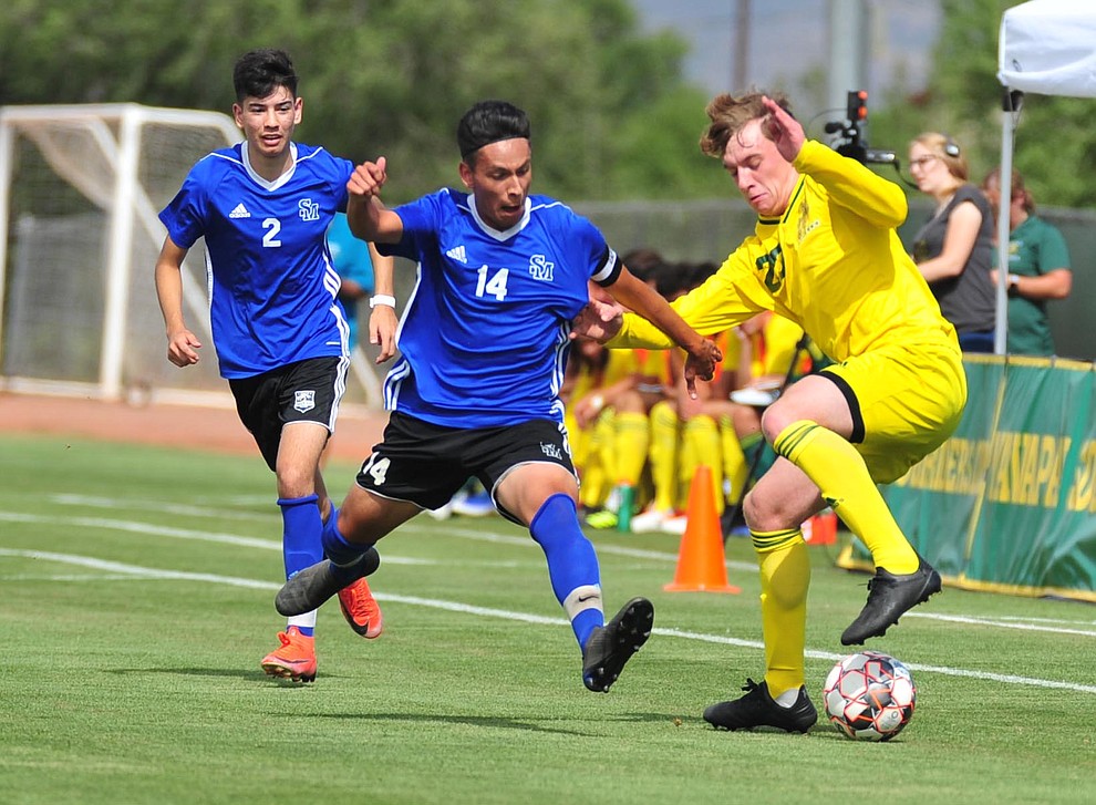 Yavapai's Loic Baures maneuvers the ball on the sideline as the Roughriders host South Mountain Community College Thursday, August 22, 2019, in Prescott Valley. (Les Stukenberg/Courier)