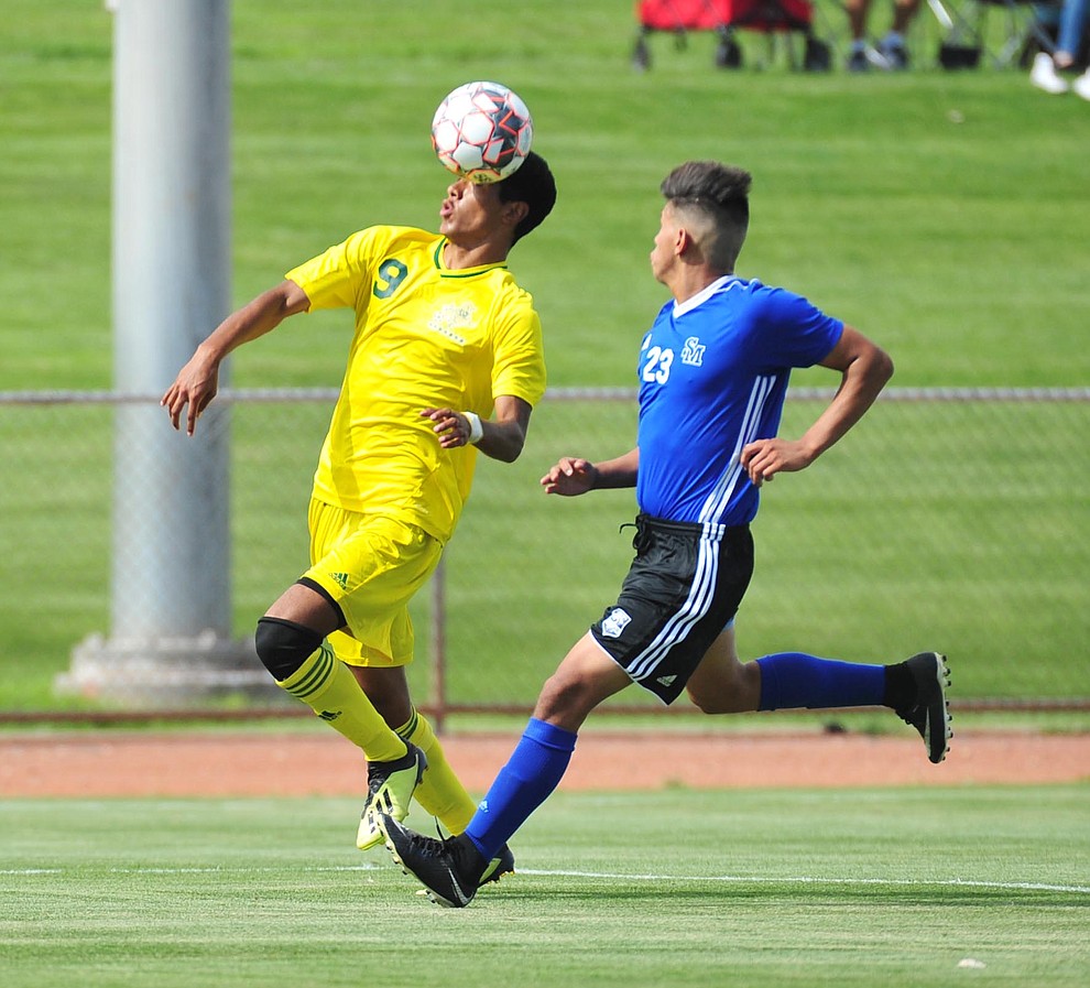 Yavapai's Jesus Medina heads the ball forward as the Roughriders host South Mountain Community College Thursday, August 22, 2019, in Prescott Valley. (Les Stukenberg/Courier)