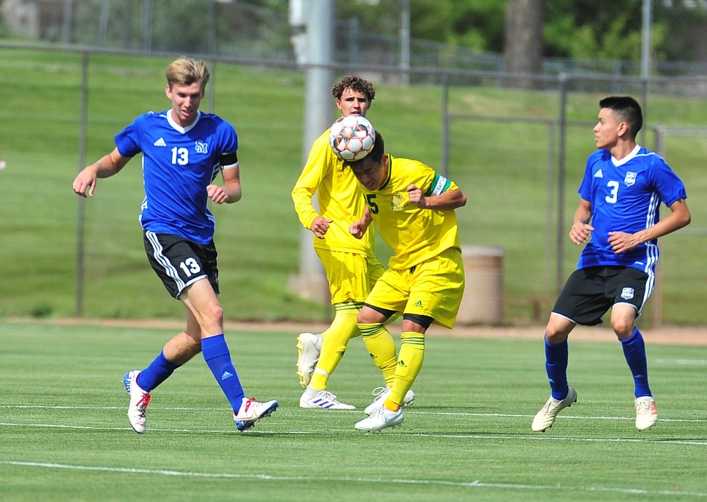 Yavapai's Kevyn Lo heads the ball forward as the Roughriders host South Mountain Community College Thursday, August 22, 2019, in Prescott Valley. (Les Stukenberg/Courier)