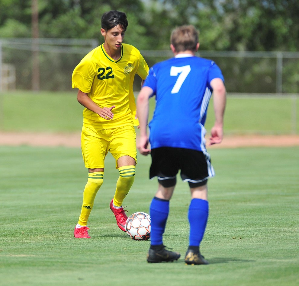 Yavapai's Manuel Quiroz drives the ball forward as the Roughriders host South Mountain Community College Thursday, August 22, 2019, in Prescott Valley. (Les Stukenberg/Courier)