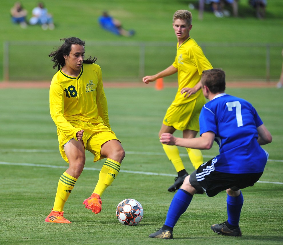 Yavapai's Kristian Quiros maneuvers the ball in the box just before he scores the third goal as the Roughriders host South Mountain Community College Thursday, August 22, 2019, in Prescott Valley. (Les Stukenberg/Courier)