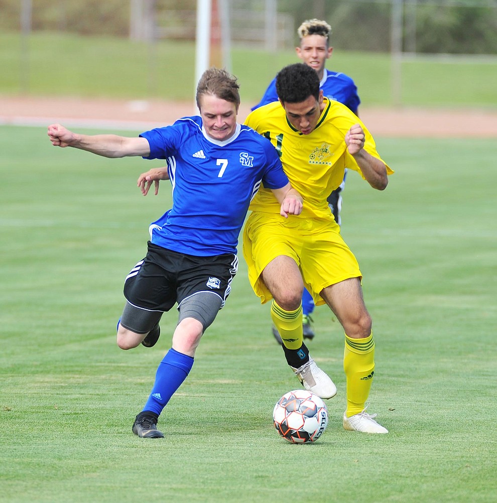 Yavapai's Jalen Atkinson battles for the ball as the Roughriders host South Mountain Community College Thursday, August 22, 2019, in Prescott Valley. (Les Stukenberg/Courier)