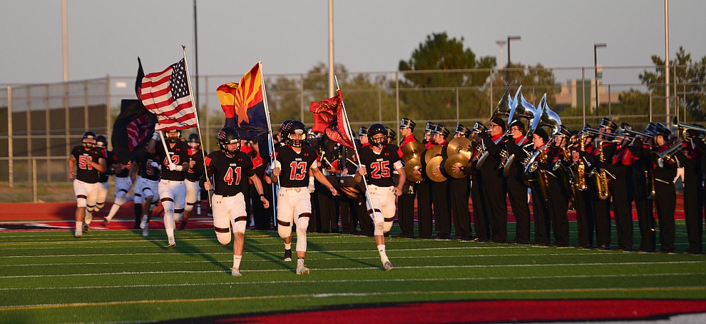 Bradshaw Mountain players take the field as the Bears host Estrella Foothills in their 2019 football home opener Friday, Aug. 23, 2019, in Prescott Valley. (Les Stukenberg/Courier)