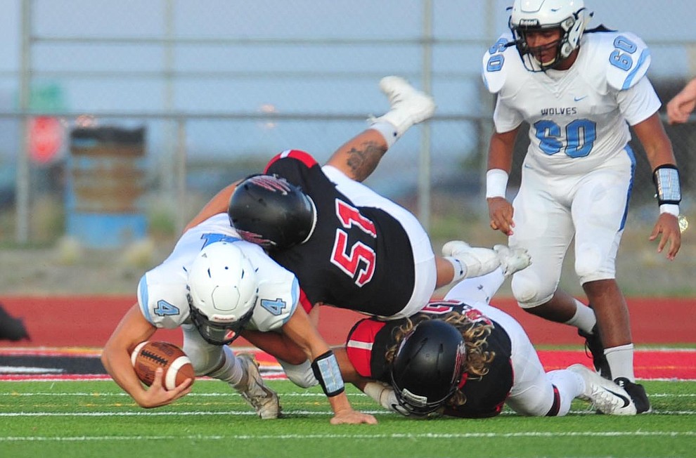 Bradshaw Mountain's Manny Salcido makes a tackle as the Bears host Estrella Foothills in their 2019 football home opener Friday, Aug. 23, 2019, in Prescott Valley. (Les Stukenberg/Courier)