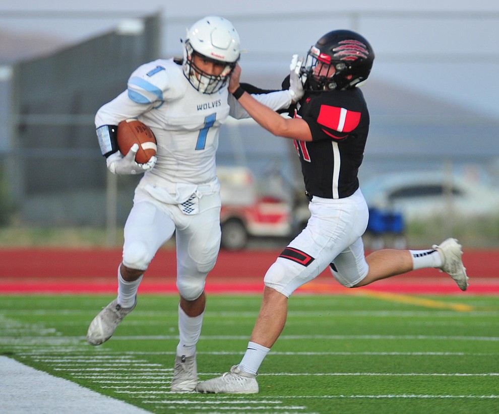Bradshaw Mountain's Daniel Gobiel forces a runner out of bounds as the Bears host Estrella Foothills in their 2019 football home opener Friday, Aug. 23, 2019, in Prescott Valley. (Les Stukenberg/Courier)