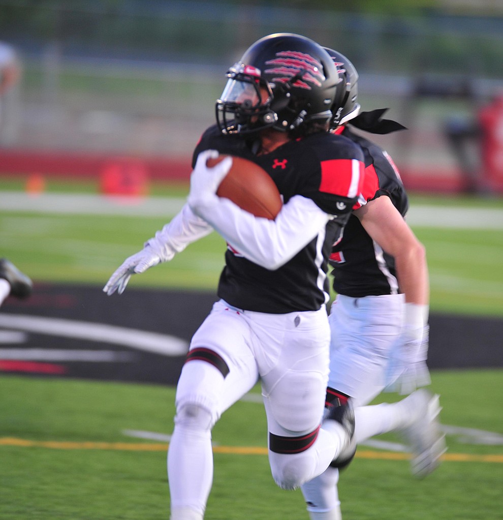 Bradshaw Mountain's Ismael Solano makes a long run after a catch as the Bears host Estrella Foothills in their 2019 football home opener Friday, Aug. 23, 2019, in Prescott Valley. (Les Stukenberg/Courier)