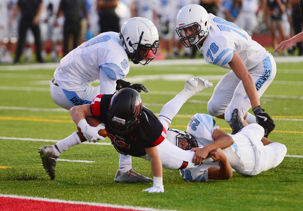 Bradshaw Mountain's Titus King stretches for the goal line as the Bears host Estrella Foothills in their 2019 football home opener Friday, Aug. 23, 2019, in Prescott Valley. (Les Stukenberg/Courier)