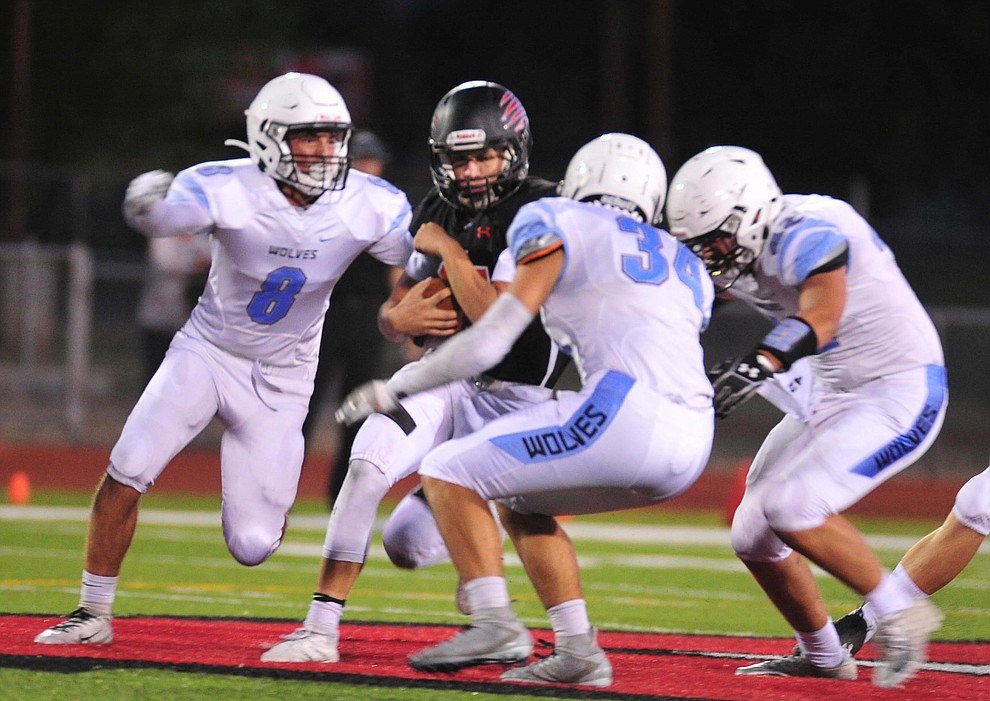 Bradshaw Mountain's Josh Grant tries to run through the defense as the Bears host Estrella Foothills in their 2019 football home opener Friday, Aug. 23, 2019, in Prescott Valley. (Les Stukenberg/Courier)