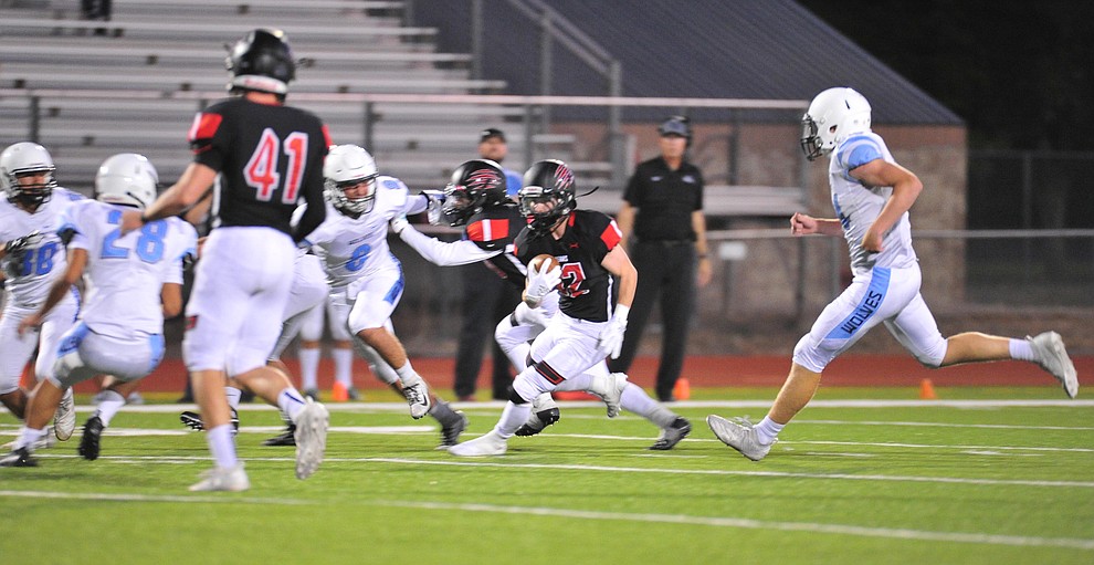 Bradshaw Mountain's Titus King tries to run through the defense as the Bears host Estrella Foothills in their 2019 football home opener Friday, Aug. 23, 2019, in Prescott Valley. (Les Stukenberg/Courier)