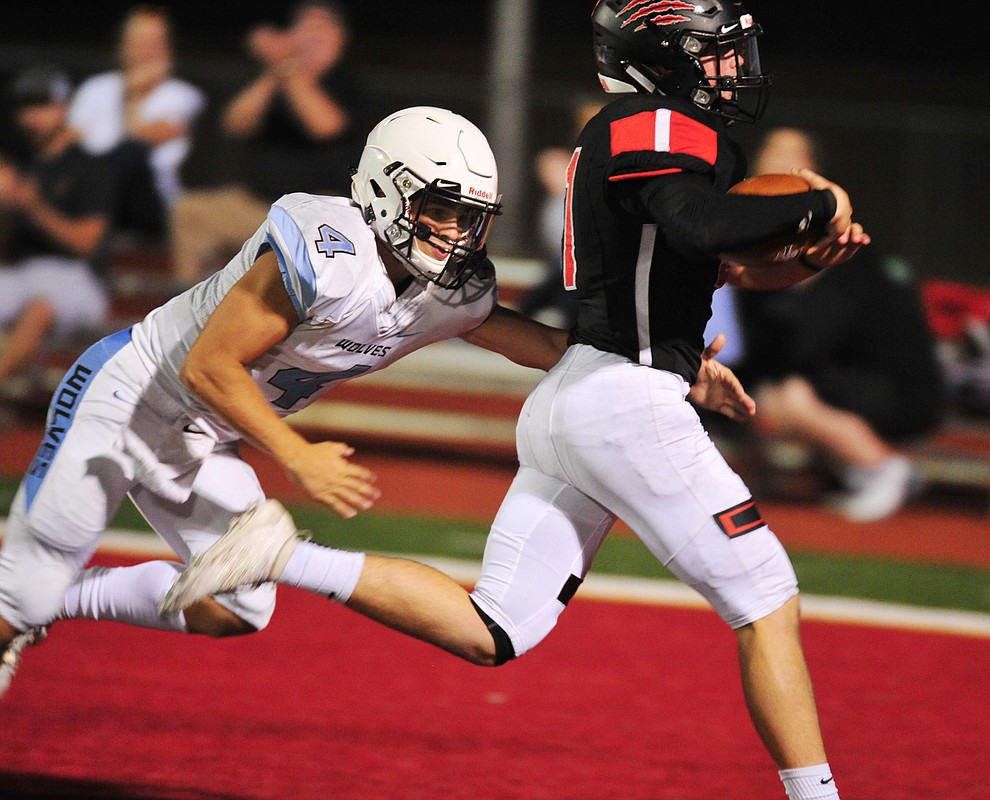 Bradshaw Mountain's Daniel Gobiel returns an interception for a touchdown as the Bears host Estrella Foothills in their 2019 football home opener Friday, Aug. 23, 2019, in Prescott Valley. (Les Stukenberg/Courier)
