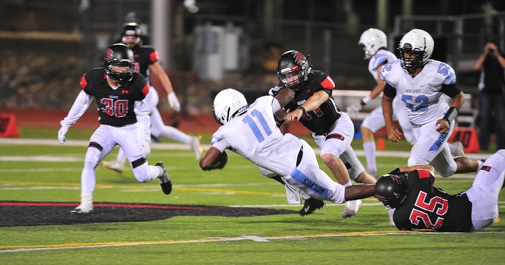 Bradshaw Mountain's Alex Cabral makes a tackle as the Bears host Estrella Foothills in their 2019 football home opener Friday, Aug. 23, 2019, in Prescott Valley. (Les Stukenberg/Courier)