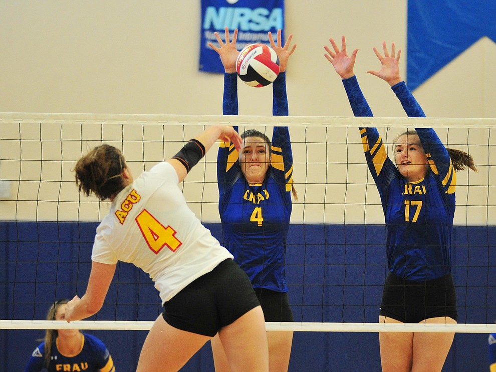 Embry Riddle's Elisa Pauzer and Julia Kjenstad get a block as the Eagles take on Arizona Christian Saturday, Aug. 24, 2019, in Prescott. (Les Stukenberg/Courier)