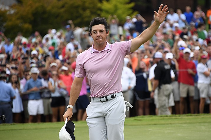 Rory McIlroy waves to the gallery after winning the Tour Championship golf tournament and The FedEx Cup Sunday, Aug. 25, 2019, at East Lake Golf Club in Atlanta. (John Amis/AP)