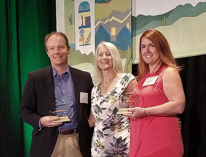 Accepting the 2019 Brian Mickelsen Housing Hero Award from the Arizona Department of Housing at its recognition ceremony in Scottsdale Aug. 21, 2019, is Prescott Valley Deputy Town Manager Ryan Judy, left, Len Mickelsen, widow of Brian Mickelsen, and Interim Executive Director Nicole Kennedy of Boys & Girls Clubs of Central Arizona. (Arizona Department of Housing/Courtesy)