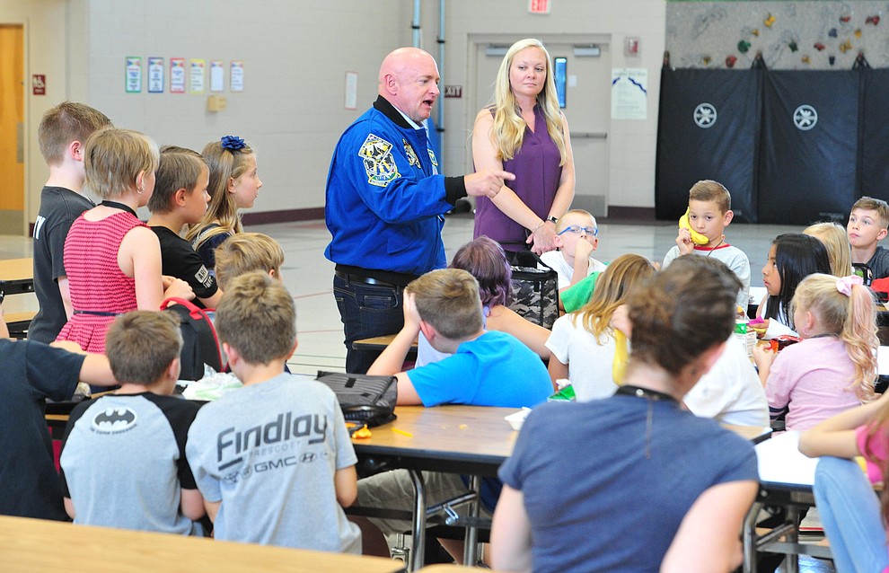 Former astronaut Mark Kelly answers questions from fourth graders as he visits Taylor Hicks Elementary School in Prescott Thursday, Aug. 29, 2019. (Les Stukenberg/Courier)