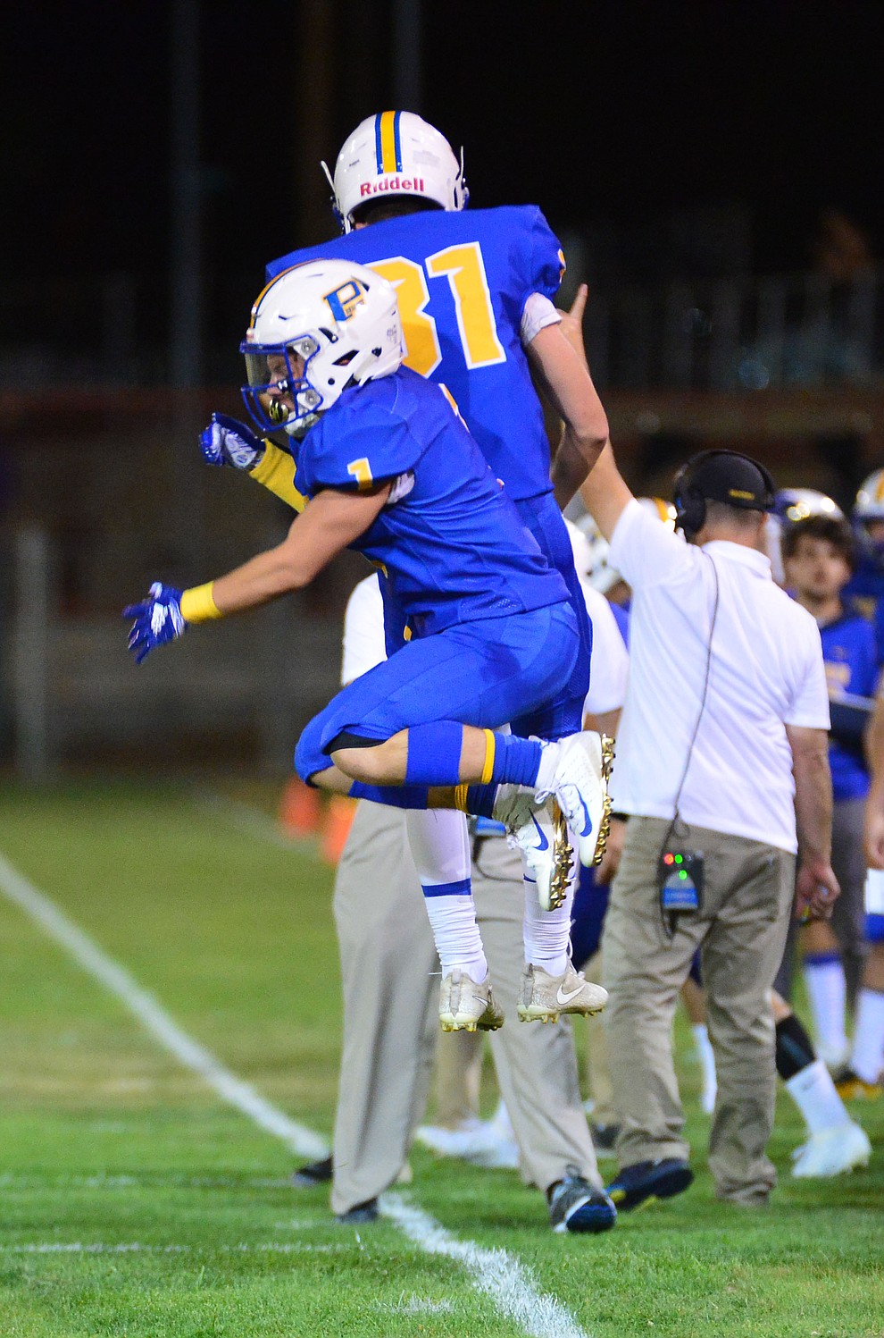 Prescott's Sylas Espetia (1) celebrates his second touchdown with Nathan Wright (31) as the Badgers held their 2019 home opener at Ken Lindley Field Friday, Aug. 30, 2019.  (Les Stukenberg/Courier)