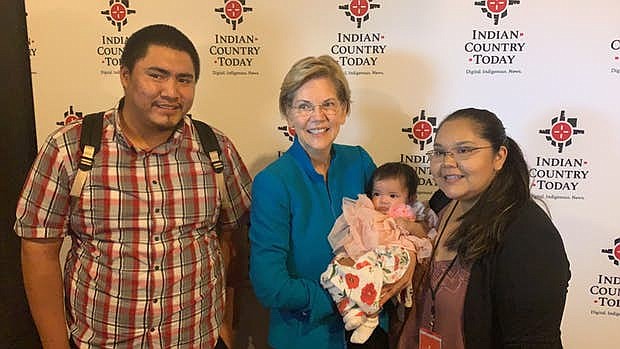 From left:  Akicita Two Eagle, Sen. Elizabeth Warren, Ramona Rose Two Eagle, and Katrina Fuller, Rosebud Sioux. Fuller is the granddaughter of OJ Semans, executive director of Four Directions. (Photo/Jourdan Bennett-Begaye, Indian Country Today)