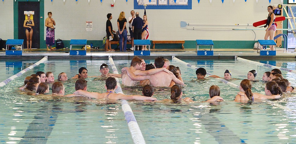 Prescott's swimmers gather before the Badgers host Arizona College Prep in a dual swim meet Thursday, Sept. 5, 2019, at the Prescott YMCA. (Les Stukenberg/Courier)