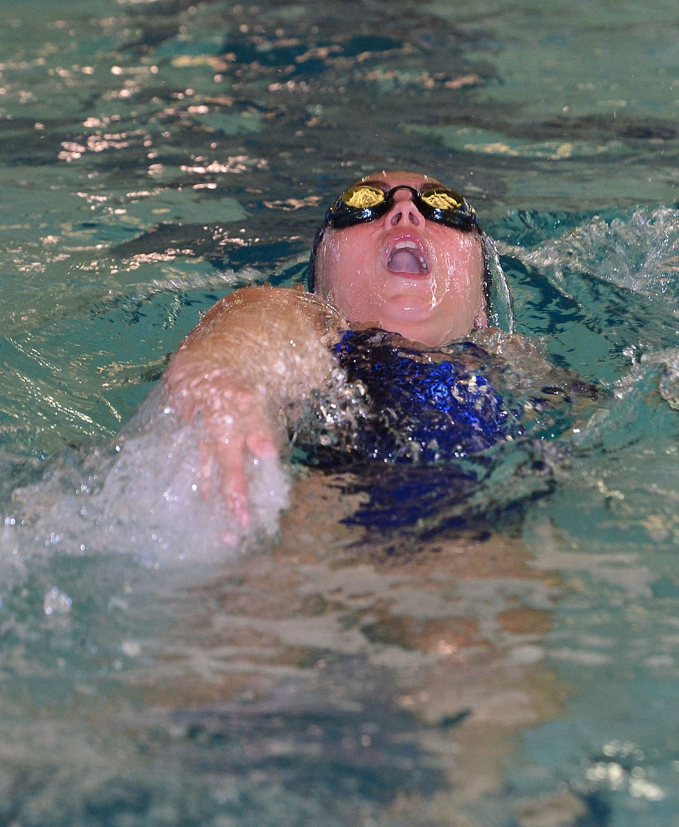 Prescott's Presley Shelton swims the backstroke leg in the 200 medley relay as the Badgers host Arizona College Prep in a dual swim meet Thursday, Sept. 5, 2019, at the Prescott YMCA. (Les Stukenberg/Courier)