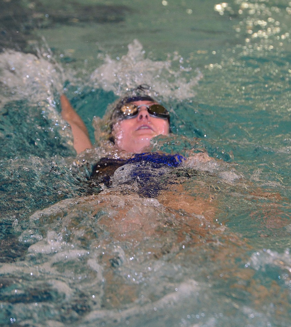 Prescott's Lily Deakin swims the backstroke in the 200 individual medley as the Badgers host Arizona College Prep in a dual swim meet Thursday, Sept. 5, 2019, at the Prescott YMCA. (Les Stukenberg/Courier)