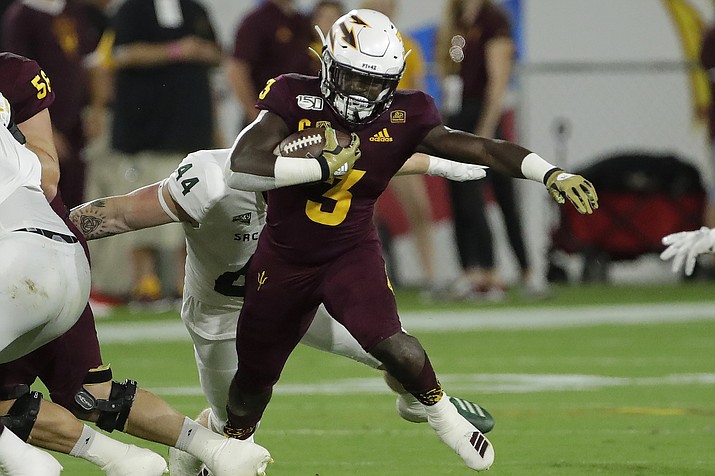 Arizona State running back Eno Benjamin (3) is chased down by Sacramento State defensive lineman Josiah Erickson (44) during the first half of an NCAA college football game Friday, Sept. 6, 2019, in Tempe. (Matt York/AP, file)