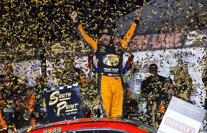 Martin Truex Jr. celebrates after winning a NASCAR Cup Series auto race at the Las Vegas Motor Speedway on Sunday, Sept. 15, 2019. (Chase Stevens/AP)