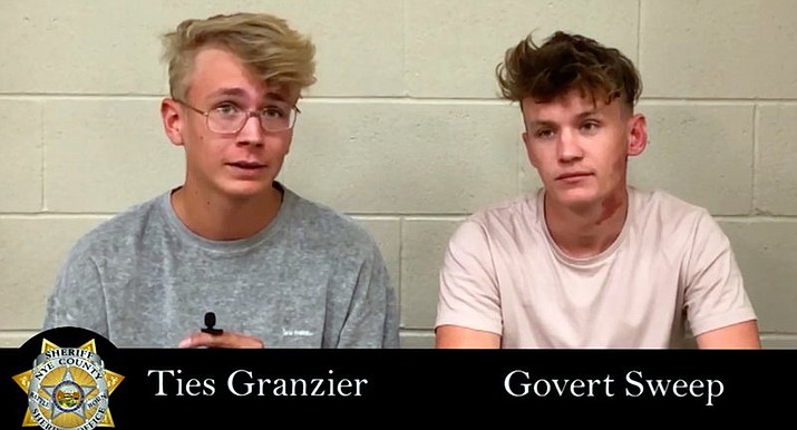 This image taken from video posted by the Nye County Sheriff's Office on Tuesday, Sept. 17, 2019, shows a recorded police interview with Dutch tourists Ties Granzier, left, and Govert Sweep, in the Nye County Jail in Pahrump, Nev. The pair, who wanted to take video of Area 51, have pleaded guilty to misdemeanor trespass and illegal parking following their arrests at the secure U.S. government site in Nevada. A judge on Monday, Sept. 16, 2019 sentenced both to three days in jail and fined them $2,280 apiece. Sweep and Granzier say they'll return to the Netherlands after their expected release Thursday. (Nye County Sheriff's Office via AP)