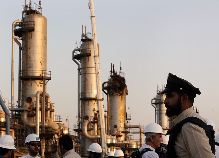 During a trip organized by Saudi information ministry, a security guarder stands alert in front of Aramco’s oil processing facility after the recent Sept. 14 attack on Aramco’s oil processing facility in Abqaiq, near Dammam in the Kingdom’s Eastern Province, Friday, Sept. 20, 2019. (Amr Nabil/AP)